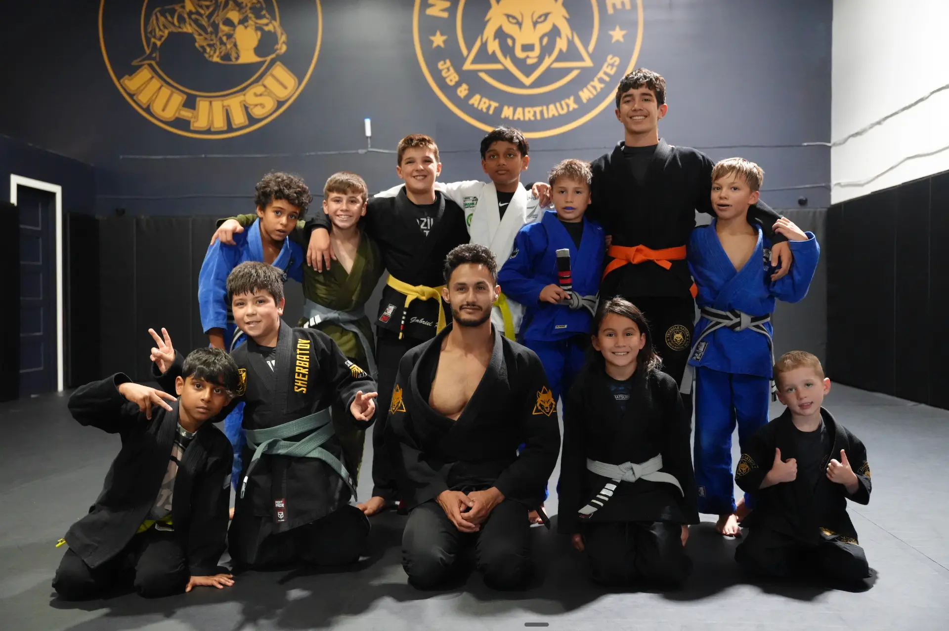 Kids and coaches at the Montreal and Laval, Quebec, Canada jiu-jitsu training sessions